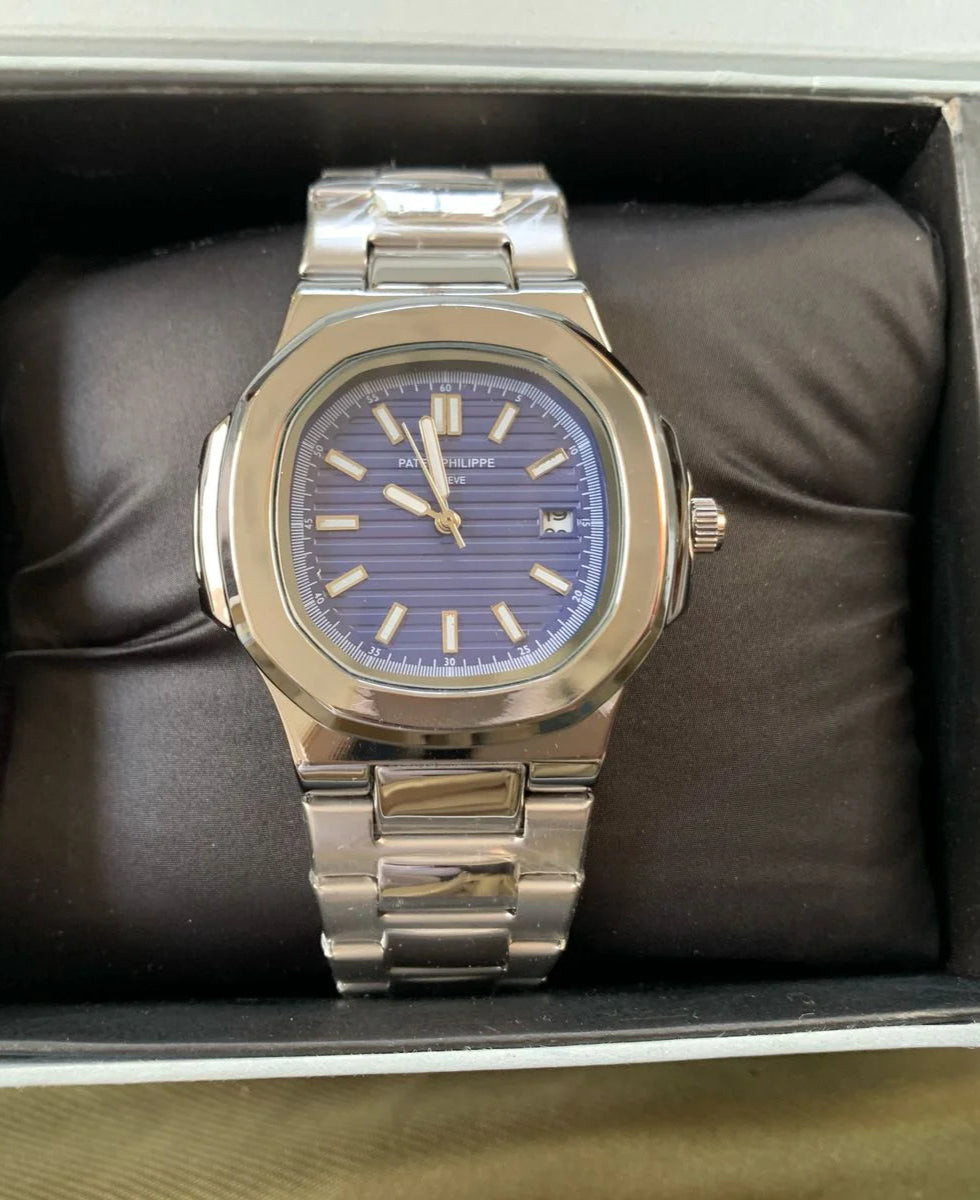 Silver watch with a blue face in a box