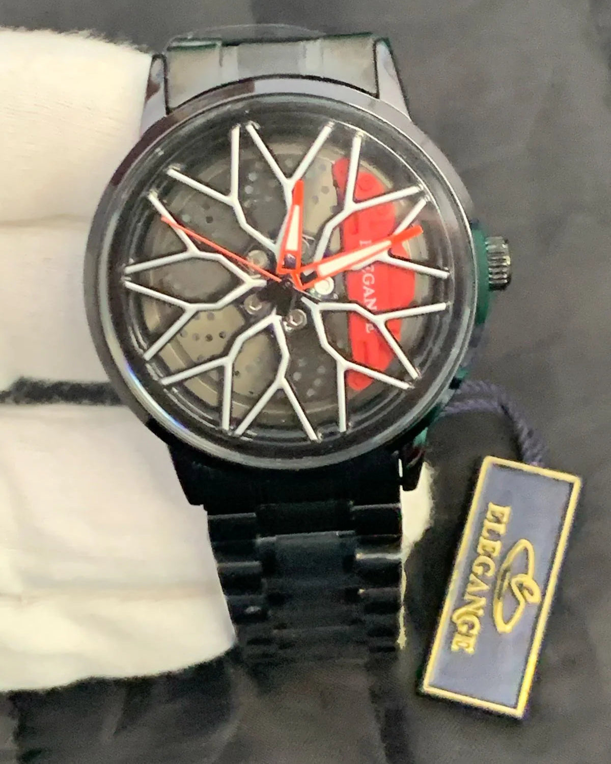 Watch with unique design and brand tag on a dark background